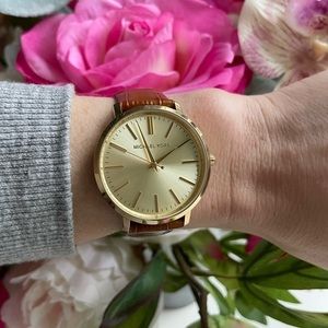 Michael Kors Jaryn brown leather watch.